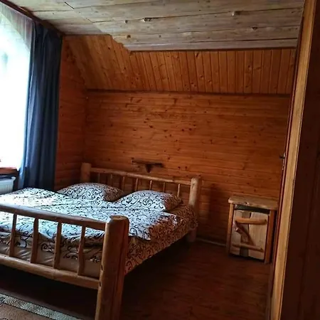 Дерев'яний котедж Zatishok Bilya Richky